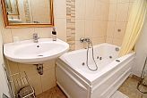 Bathroom with jacuzzi bathtub - Pension Panorama - apartments in Eger