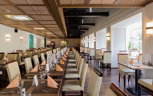 Elegant restaurant of CE Plaza Hotel  in the city center of Siófok for hotel guests